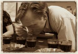 Doug Welch sampling coffee